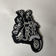 Ska couple on scooter