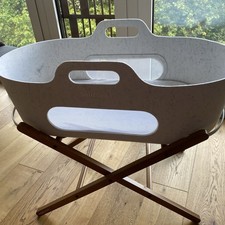 Snuz baskit  Moses basket, walnut stand, mattress protector and a few sheets