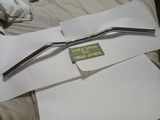 SUZUKI CHROME HANDLEBARS, 27 ins wide,22mm( 7/8in) DIAM, Approx 1 inch HIGH .