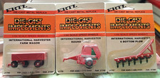 3 ERTL Die-Cast Implements
