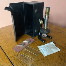 Vintage Octopus Series microscope, likely from the 50s-70s in original case