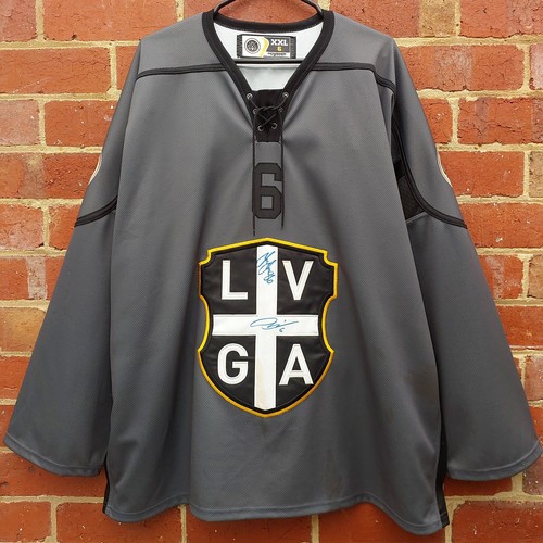 Signed game worn - game,