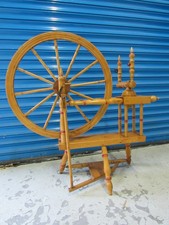 A NICE QUALITY SAXONY BEECHWOOD 24 INCH SPINNING WHEEL. NO SPOOL OR BOBBIN