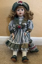 Porcelain doll with stand c. 1990s