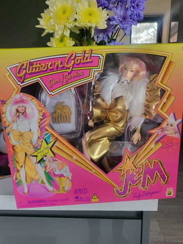 Glitter and gold jem doll - and,