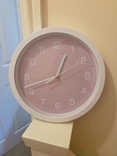 White And Pink Wall Clock