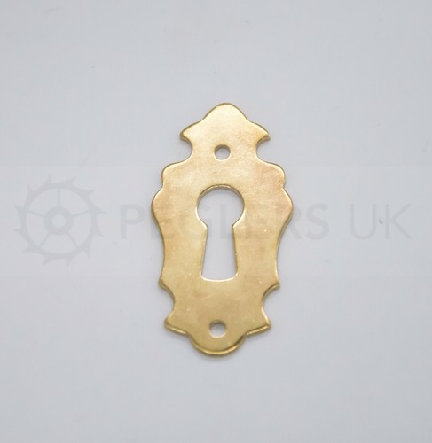 Small brass escutcheon key - brass,