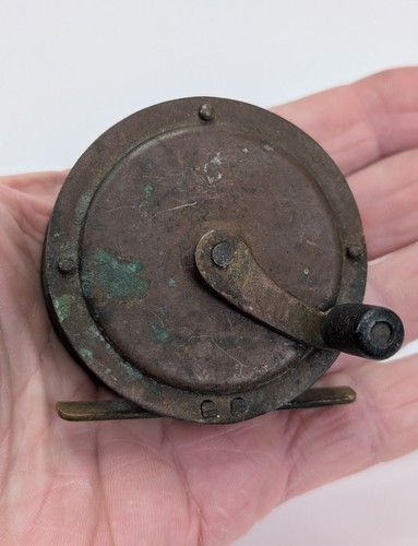 Antique brass fishing reel - brass,