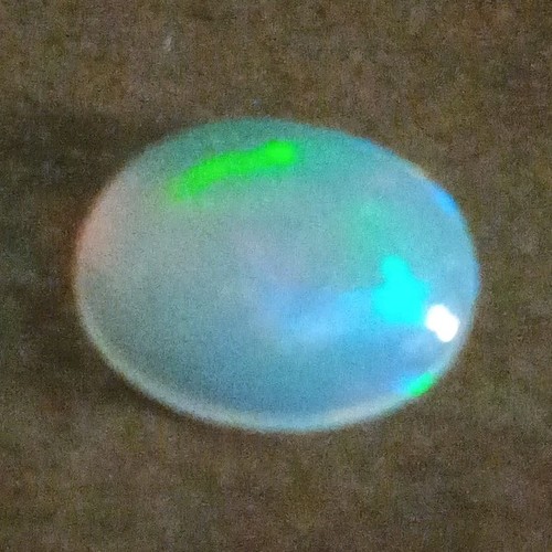Polished white opal oval - white,