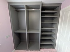 Wardrobes. No doors, just carcasses. Was used as a walk-in wardrobe.