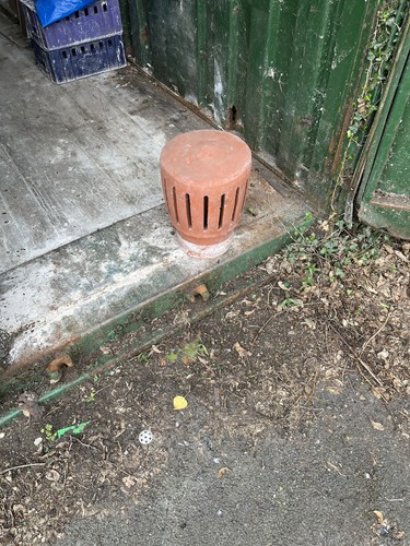 Terracotta red clay chimney - clay,