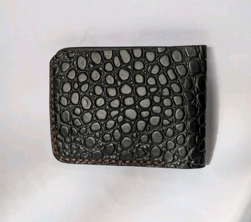 Hand stitched alligator - stitched,