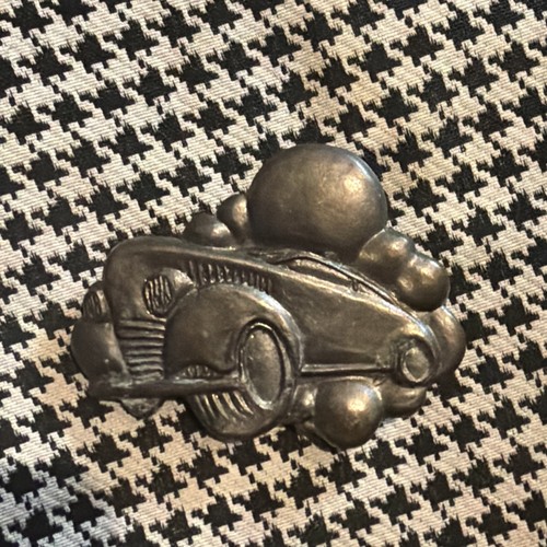 Cast metal automobile belt - cast,