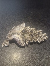 Sphinx brooch a silver-tone