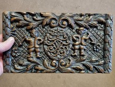 Antique Carved Oak Panel 'Naive Men Either Side Of A Familly Crest'