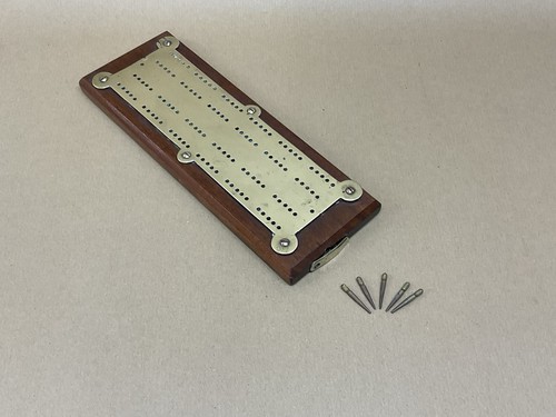 Brass and oak cribbage board - and,