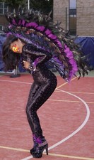 One of a kind costume, you won't find another like it. Black/purple.