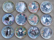 LESLEY ANNE IVORY - CATS AMONG THE FLOWERS - COMPLETE SET OF 12 PLATES WITH COA.