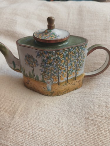 Trade plus aid miniture teapot