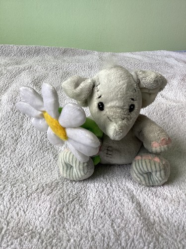 Elliot buttons elephant with - elephant,