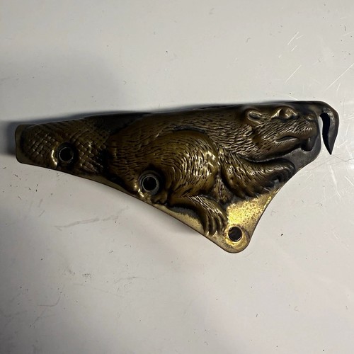 Cairns fire helmet - cairns, carved