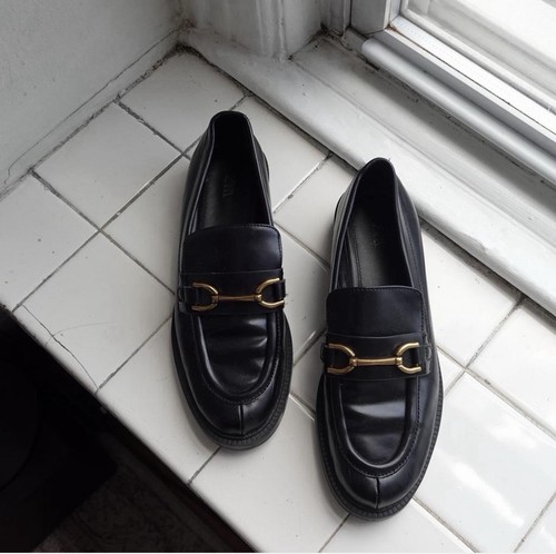Black leather loafers with