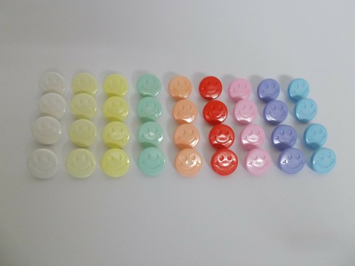 Happy face buttons round - face,