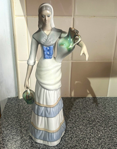 Porcelain woman figurine - porcelain,