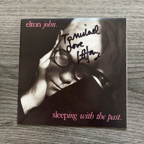 Elton john sleeping with - -,