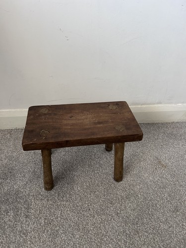 Antique oak milking stool.