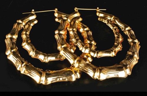 Pair large gold round - of,