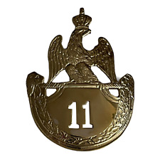 The French Napoleonic 11th Regiment (11ème Régiment) Shako plate