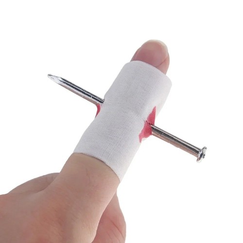 Nail through finger - fake, blood