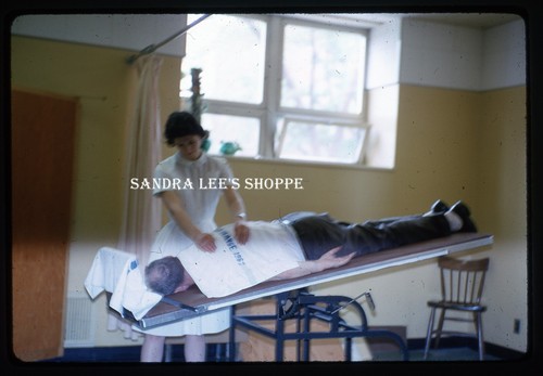 1964 slide woman giving man - 1964,