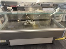 Serve over counter display fridge working  6ft wide  very good condition 