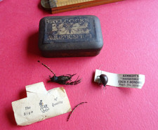 A VINTAGE ALLCOCK ARTIFICIAL