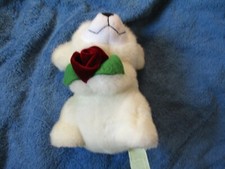 Pretty white bear holding a red rose height 8ins