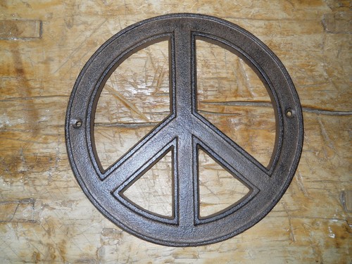 Cast iron hippie peace sign - cast,