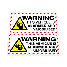 2x WARNING VEHICLE ALARMED AND