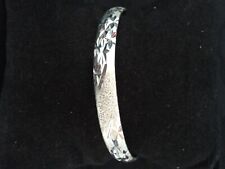 Silver diamond cut bangle