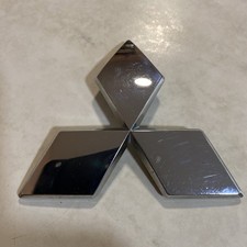 USED Emblem Plastic 7415A182 for Mitsubishi 7415-A182.