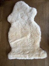 Sheepskin pram liner 39 X 25 in (at the widest point) Pre-owned