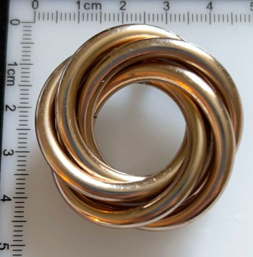 Gold tone circular knot - gold,