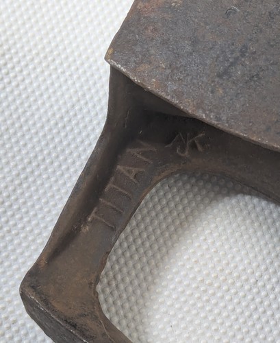 Antique cast iron ajk titan - iron,
