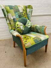 Parker Knoll  Wingback Chair Upholstered In Green Colours Patchwork Design
