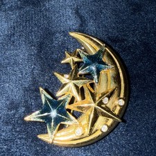 Vintage enamelled moon and