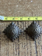 A PAIR OF MILITARY BRASS