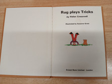 RUG PLAYS TRICKS - HELEN