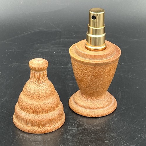 Hand turned wooden perfume - hand,
