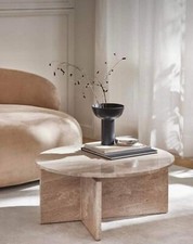 Round travertine coffee table